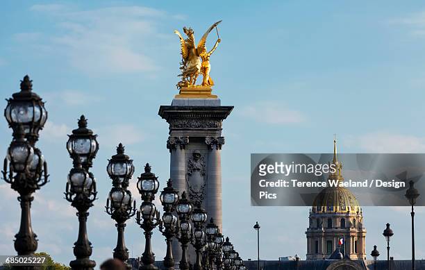 view of les invalides from pont alexandre iii - hotel des invalides stock pictures, royalty-free photos & images