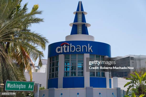 Citibank sign logo in round small tower architecture detail of building. Citibank is the consumer division of Citigroup.