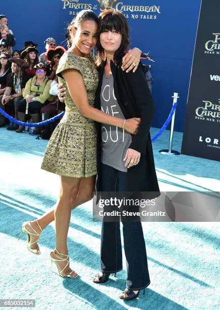 Dania Ramirez, Elizabeth Keener arrives at the Premiere Of Disney's "Pirates Of The Caribbean: Dead Men Tell No Tales" at Dolby Theatre on May 18,...