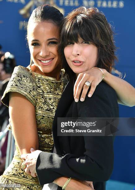 Dania Ramirez, Elizabeth Keener arrives at the Premiere Of Disney's "Pirates Of The Caribbean: Dead Men Tell No Tales" at Dolby Theatre on May 18,...