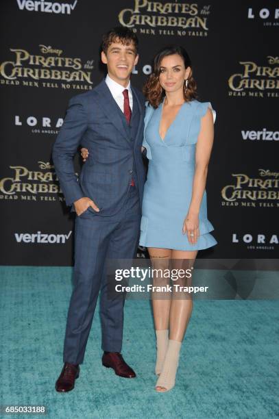 Actor Brenton Thwaites and Chloe Pacey arrive at the premiere of Disney's "Pirates of the Caribbean: Dead Men Tell No Tales" at the Dolby Theatre on...