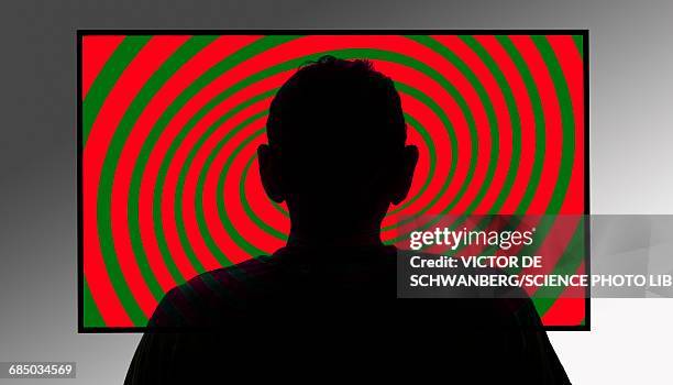 person in front of swirly tv screen - hypnotherapy stock-grafiken, -clipart, -cartoons und -symbole