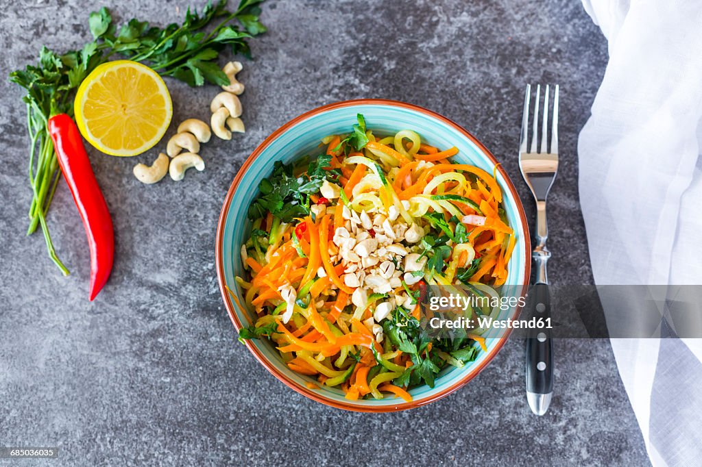 Garnished vegetable noodles in a bowl