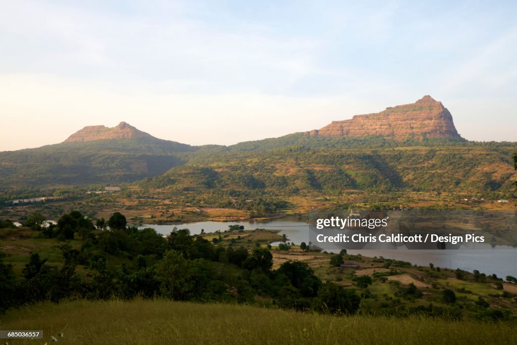 Western Ghats landscape with hills, ruined hill forts and lake