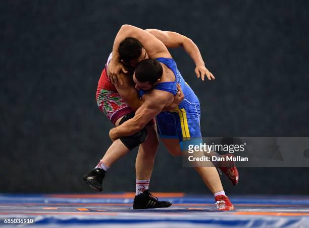 Amir Mohammadi of Iran competes against Mamed Ibragimov of Kazakhstan in the Mens Freestyle Wrestling 97kg Semi Final during day eight of Baku 2017 -...
