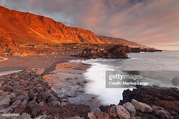 playa de charco verde beach at sunset, puerto naos, la palma, canary islands, spain - puerto naos stock pictures, royalty-free photos & images