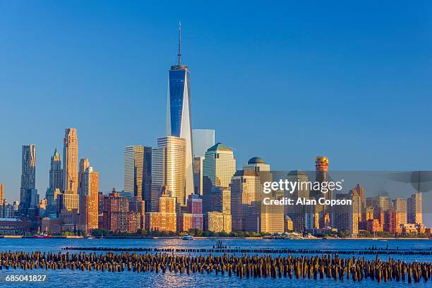 usa, new york, manhattan, lower manhattan and world trade center, freedom tower across hudson river - alan copson fotografías e imágenes de stock