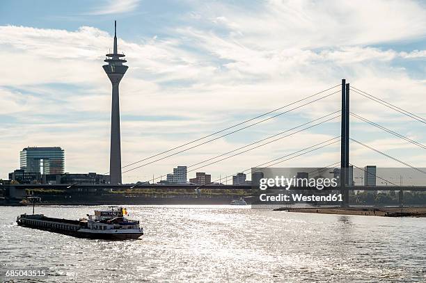 germany, duesseldorf, view to stadttor and rhine tower with rheinknie-bruecke and rhine river - rhein stock-fotos und bilder