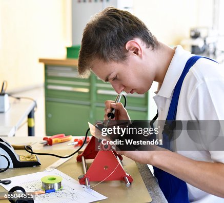 Student assembling circuit board Student assembling circuit board