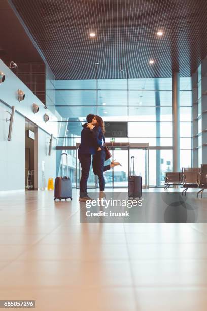 1,392 Passengers Hugging Airport Stock Photos, High-Res Pictures, and ...
