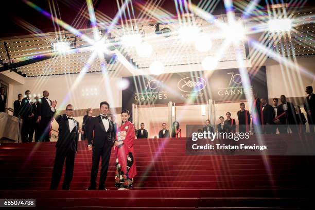 Director Takashi Miike, Takuya Kimura and Hana Sugisaki attend the 'Blade Of The Immortal ' premiere during the 70th annual Cannes Film Festival at...
