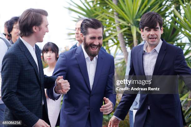 Actors Paul Dano Jake Gyllenhaal and Devon Bostick attend the "Okja" photocall during the 70th annual Cannes Film Festival at Palais des Festivals on...