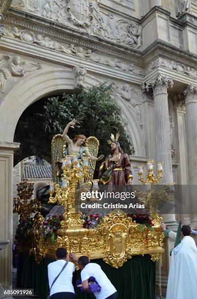 Processional sculpture of the risen Christ entering the Basilica of St. Mary of the Alcazar, during the preparation of the general Good Friday...