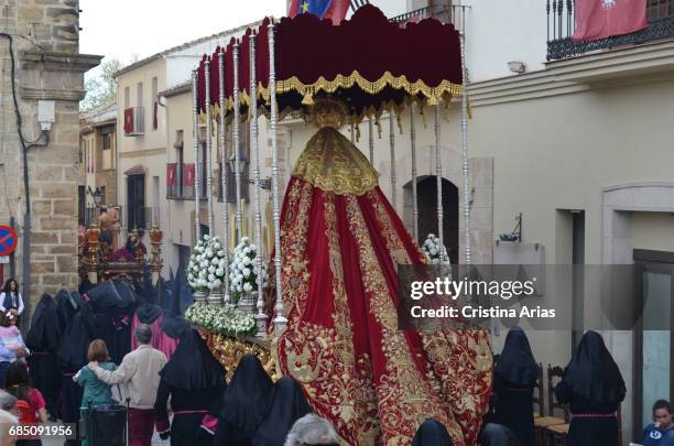 The sculptural image of Our Lady of Charity with its large embroidered mantle, in the Good Friday procession in Ubeda, Jaen, Andalusia, Spain, April...