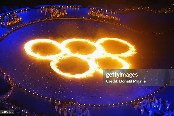 The Olympic Rings in flames during the Opening Ceremony of the Salt Lake City Winter Olympic Games at the Rice-Eccles Olympic Stadium in Salt Lake...