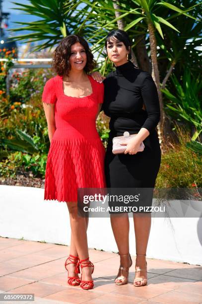 Tunisian director Kaouther Ben Hania and Tunisian actress Mariam Al Ferjani pose on May 19, 2017 during a photocall for the film 'Beauty and the...