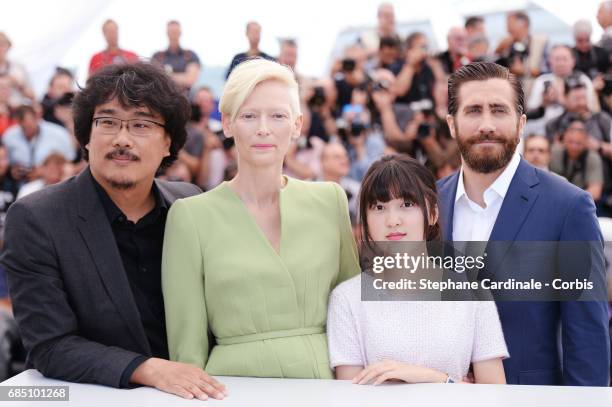 Director Bong Joon-Ho, actors Tilda Swinton, Ahn Seo-Hyun and Jake Gyllenhaal attend the "Okja" photocall during the 70th annual Cannes Film Festival...