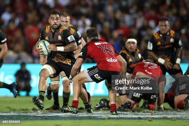 Liam Messam of the Chiefs runs the ball during the round 13 Super Rugby match between the Chiefs and the Crusaders at ANZ Stadium on May 19, 2017 in...