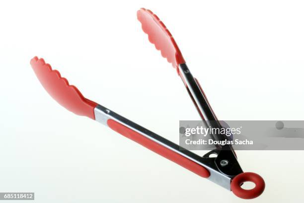 serving tongs kitchen utensil - tongs stock pictures, royalty-free photos & images