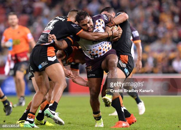 Sam Thaiday of the Broncos takes on the defence during the round 11 NRL match between the Brisbane Broncos and the Wests Tigers at Suncorp Stadium on...