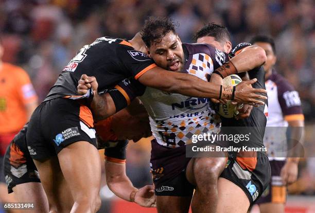 Sam Thaiday of the Broncos takes on the defence during the round 11 NRL match between the Brisbane Broncos and the Wests Tigers at Suncorp Stadium on...