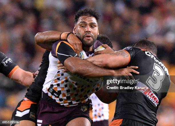 Sam Thaiday of the Broncos takes on the defence during the round 11 NRL match between the Brisbane Broncos and the Wests Tigers at Suncorp Stadium on...