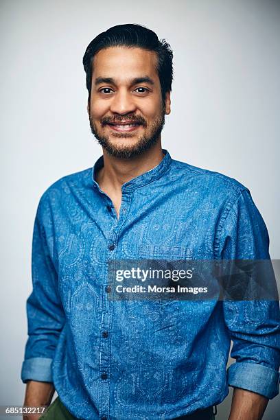 confident businessman in shirt smiling over white - brown eyes stock pictures, royalty-free photos & images