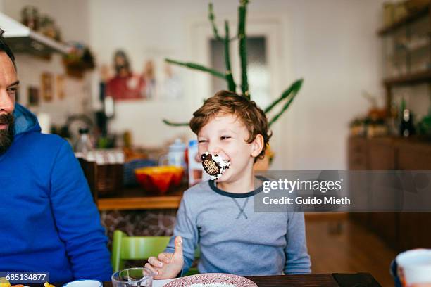 boy having fun. - berliner gebäck stock-fotos und bilder