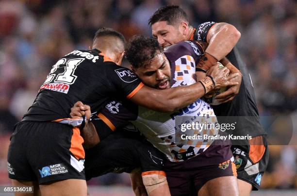 Sam Thaiday of the Broncos takes on the defence during the round 11 NRL match between the Brisbane Broncos and the Wests Tigers at Suncorp Stadium on...