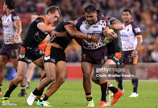 Sam Thaiday of the Broncos takes on the defence during the round 11 NRL match between the Brisbane Broncos and the Wests Tigers at Suncorp Stadium on...