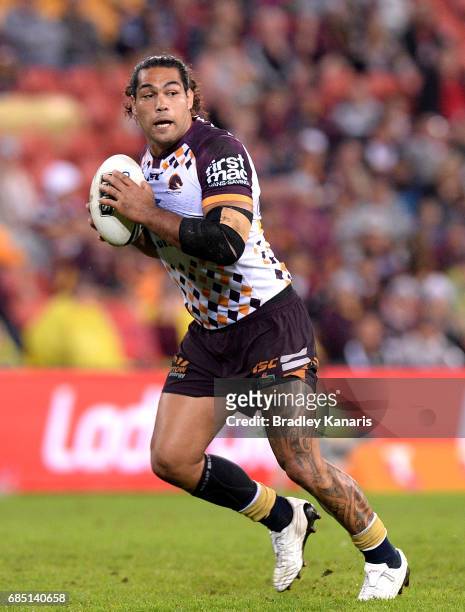 Adam Blair of the Broncos looks to pass during the round 11 NRL match between the Brisbane Broncos and the Wests Tigers at Suncorp Stadium on May 19,...