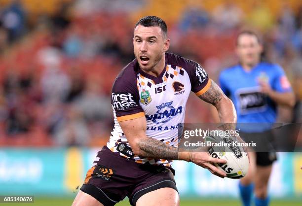 Darius Boyd of the Broncos looks to pass during the round 11 NRL match between the Brisbane Broncos and the Wests Tigers at Suncorp Stadium on May...