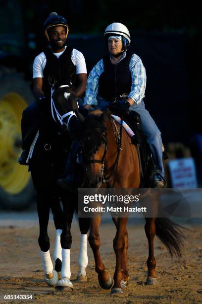 Exercise rider Nick Bush rides Kentucky Derby winner Always Dreaming as he trains for the upcoming Preakness Stakes at Pimlico Race Course on May 19,...