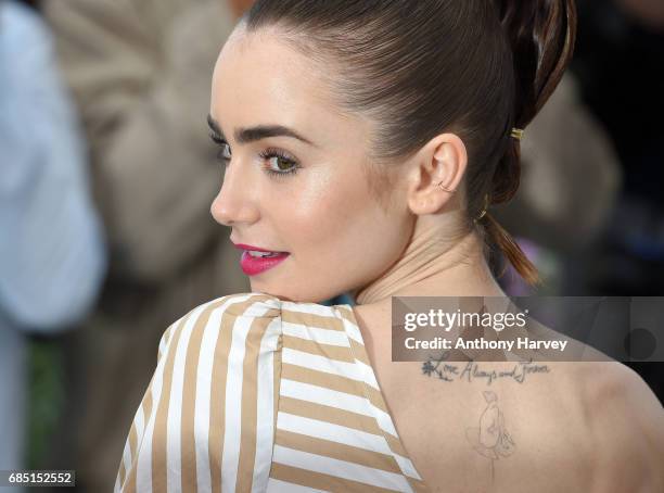 Lily Collins attends the "Okja" Photocall during the 70th annual Cannes Film Festival at Palais des Festivals on May 19, 2017 in Cannes, France.