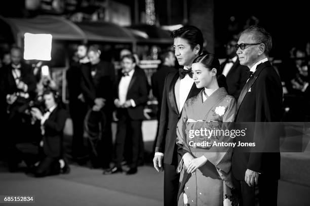 Takuya Kimura, Hana Sugisaki and director Takashi Miike attend the 'Blade Of The Immortal ' premiere during the 70th annual Cannes Film Festival at...