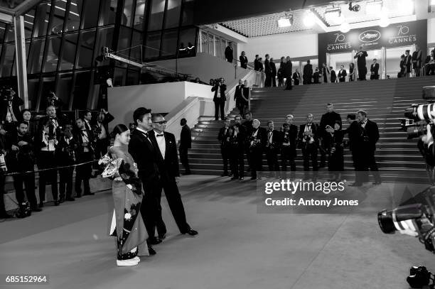 Hana Sugisaki, Takuya Kimura and director Takashi Miike attend the 'Blade Of The Immortal ' premiere during the 70th annual Cannes Film Festival at...