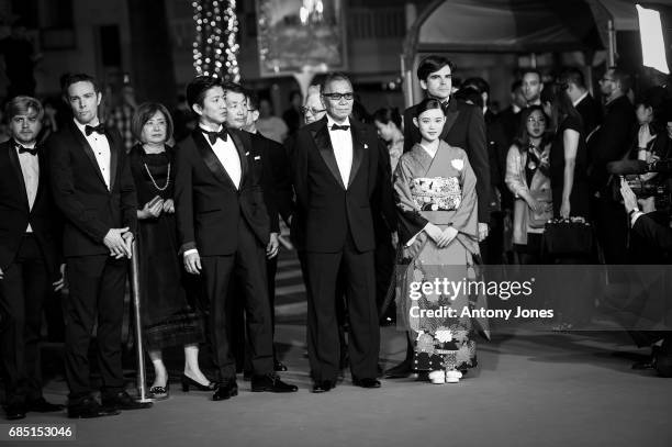 Takuya Kimura, director Takashi Miike and Hana Sugisaki attend the 'Blade Of The Immortal ' premiere during the 70th annual Cannes Film Festival at...