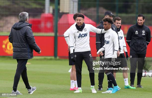 Manager Jose Mourinho, Jesse Lingard and Angel Gomes of Manchester United in action during a first team training session at Aon Training Complex on...