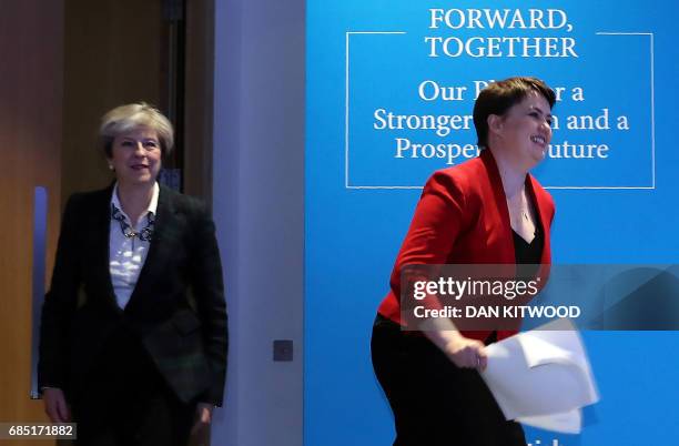 Britain's Prime Minister Theresa May and Scottish Conservative leader Ruth Davidson arrive at the launch of their Scottish manifesto in Edinburgh on...