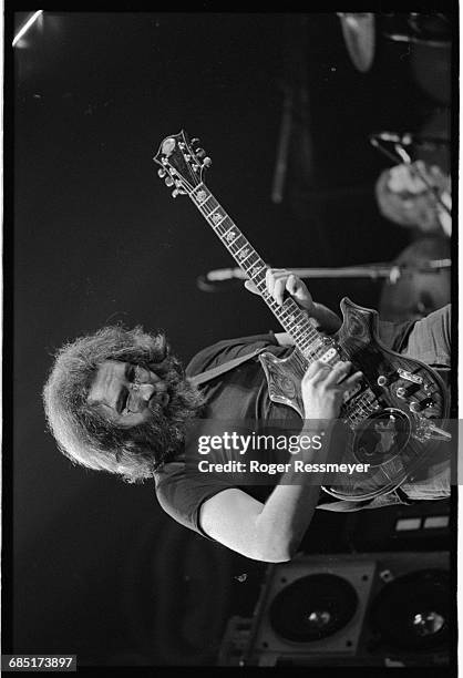 Jerry Garcia, guitarist and singer for the rock band Grateful Dead, plays his "Tiger Rose" guitar.