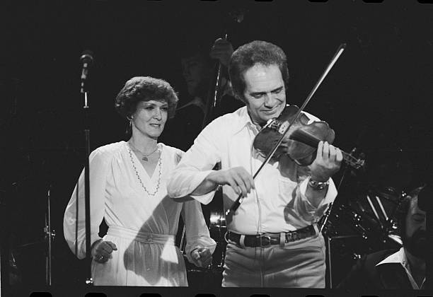 Merle Haggard performs at the Headliner Room at Harrah's in Reno. The back-up singer is Haggard's ex-wife Bonnie Owens.