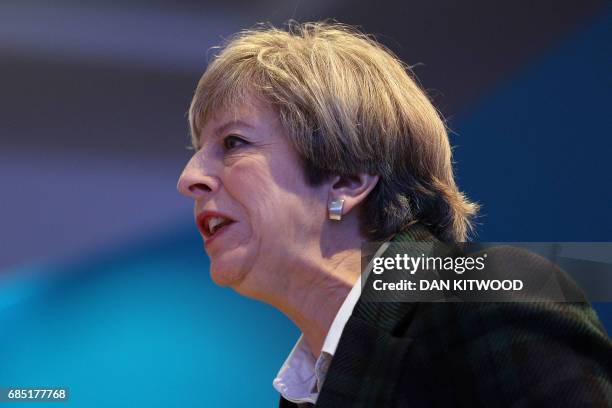 Britain's Prime Minister Theresa May speaks at the launch of the Scottish manifesto by Scottish Conservative leader Ruth Davidson in Edinburgh on May...