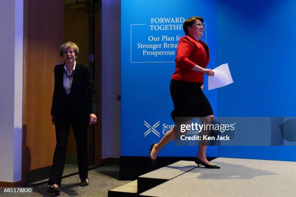 Scottish Conservative leader Ruth Davidson bounds on to the stage as she and Prime Minister Theresa May arrive for the launch of the Scottish...