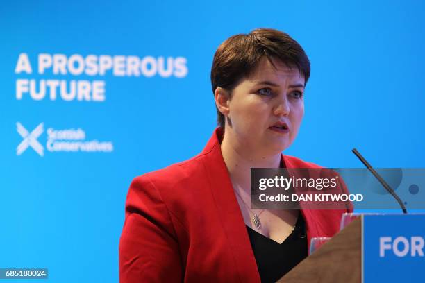 Scottish Conservative leader Ruth Davidson presents the Scottish manifesto at the launch in Edinburgh on May 19, 2017. / AFP PHOTO / POOL / Dan...