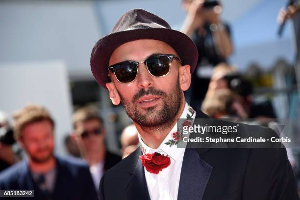 Director JR attends the "Faces, Places " premiere during the 70th annual Cannes Film Festival at Palais des Festivals on May 19, 2017 in Cannes,...