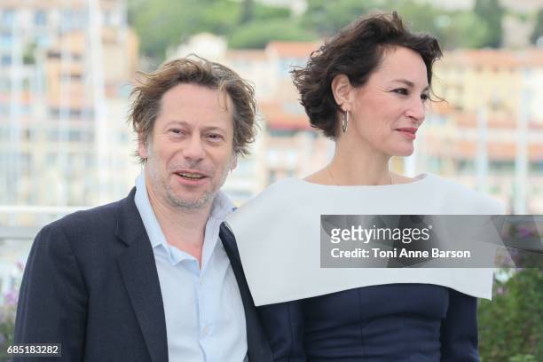 Mathieu Amalric and Jeanne Balibar attend the "Barbara" photocall during the 70th annual Cannes Film Festival at Palais des Festivals on May 18, 2017...