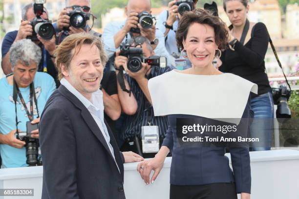 Mathieu Amalric and Jeanne Balibar attend the "Barbara" photocall during the 70th annual Cannes Film Festival at Palais des Festivals on May 18, 2017...