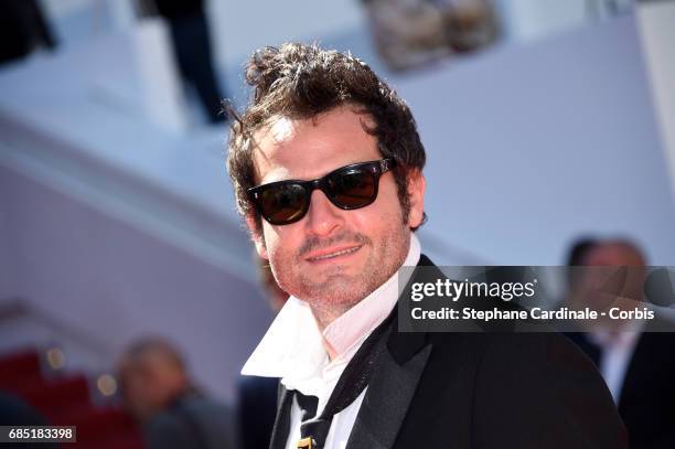 Composer Matthieu Chedid attends the "Faces, Places " screening during the 70th annual Cannes Film Festival at Palais des Festivals on May 19, 2017...