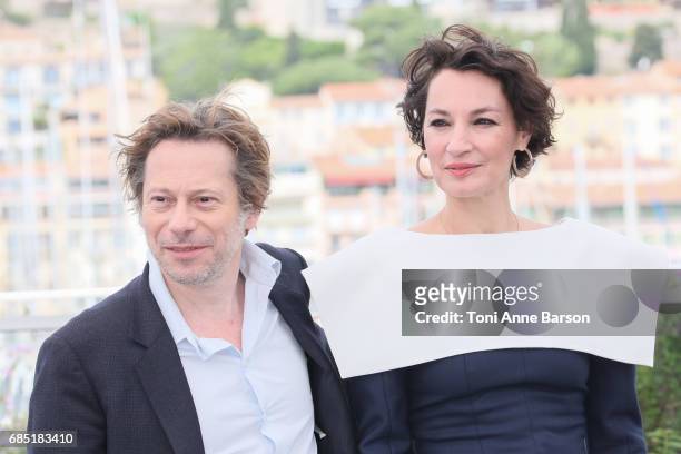 Mathieu Amalric and Jeanne Balibar attend the "Barbara" photocall during the 70th annual Cannes Film Festival at Palais des Festivals on May 18, 2017...