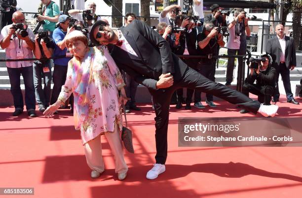 Directors Agnes Varda and JR attend the "Faces, Places " screening during the 70th annual Cannes Film Festival at Palais des Festivals on May 19,...